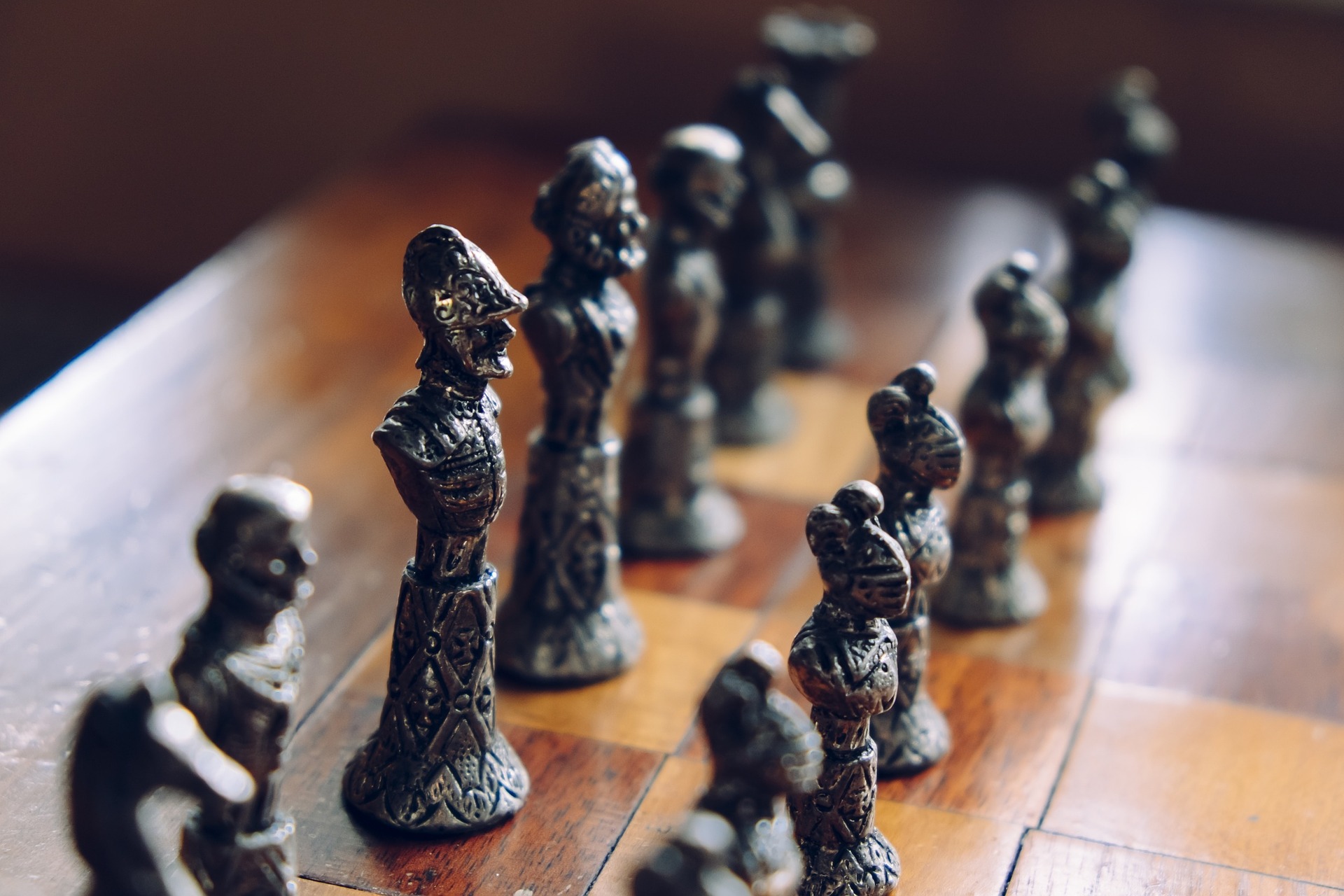 chess pieces set up on board